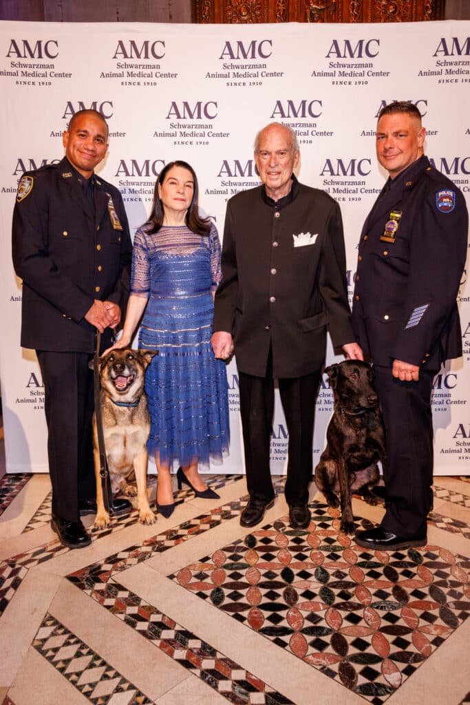 Detective Paul Urquiaga with K9 Louie, Nicole Seligman, Robert Liberman, Detective Ronald Spalazzi with K9 Mos