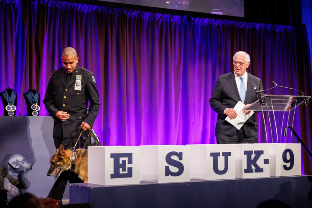 Detective Paul Urquiaga w. K9 Louie and John Miller