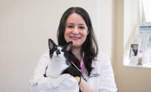 Dr. Spano holds a cat